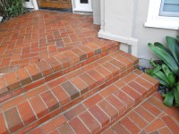 Exterior brick porch deep cleaned and sealed with imgregnating sealer.