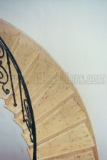 Historic Limestone staircase completely stripped to bare stone and sealed with medium shine sealer.