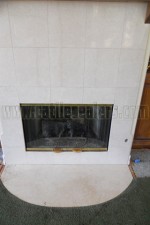 White Limestone fireplace deep cleaned and sealed with impregnating sealer.